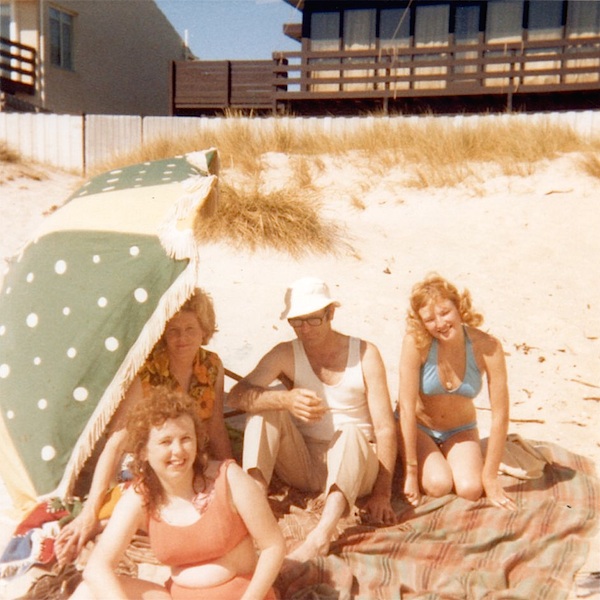 Lyn Paul with Peter Doyle's family relaxing on the beach in Australia.