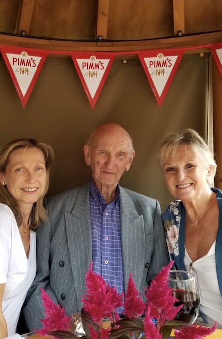 Lyn Paul (right) with her sister Nikki (left) and their father (centre), celebrating his 95th birthday.