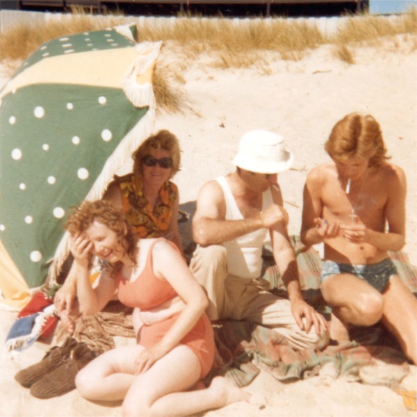 Lyn Paul with Peter Doyle;s family relaxing on the beach in Australia.